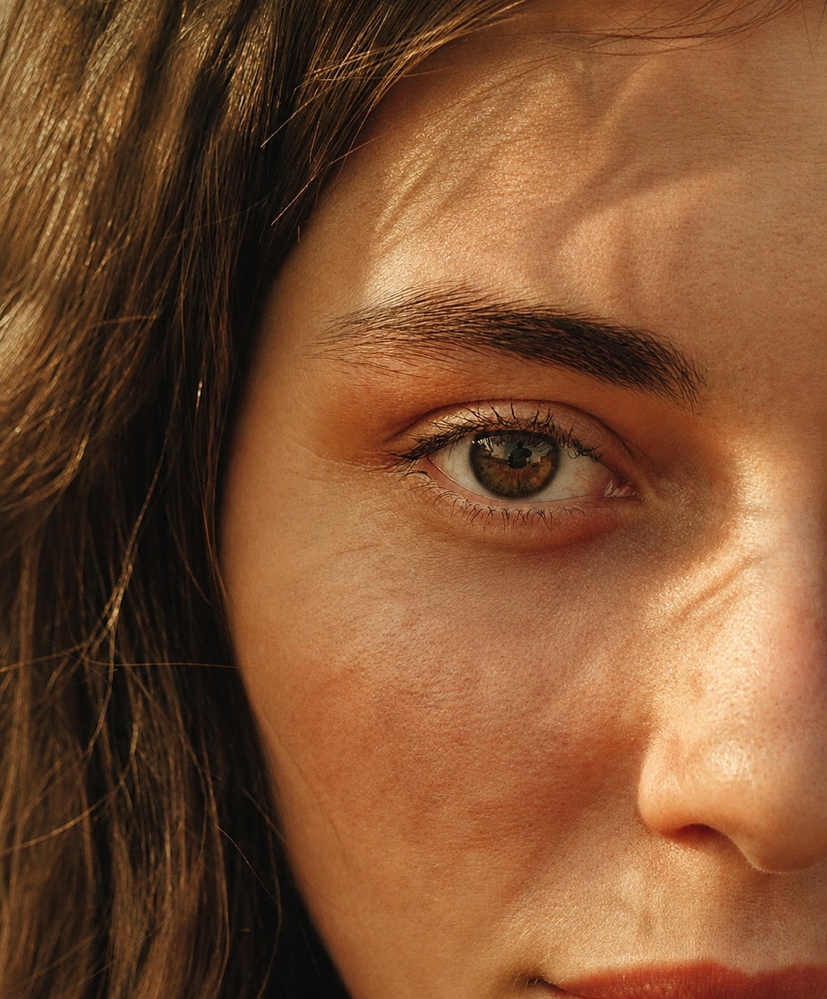 Close-up of a person's eye and face.